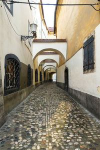 Empty footpath leading to building