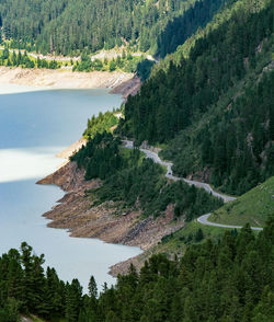 The kaunertal valley glacier road near the side of the gepatsch-stausee lake