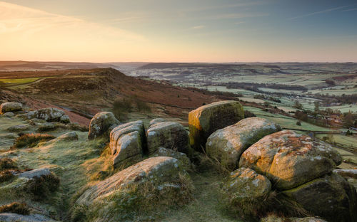 Scenic view of landscape against sky during sunset