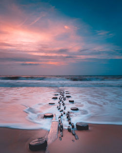 Scenic view of sea against sky during sunset