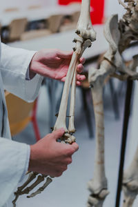 Close-up of man holding hands