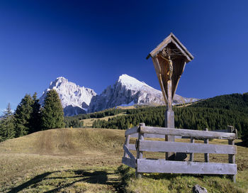 Crucifix with mountains in background
