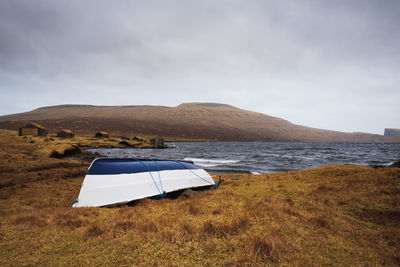 Tent on beach against sky