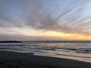 Scenic view of sea against sky during sunset