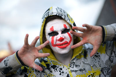 Close-up of boy with face paint