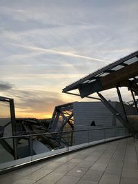 Built structure against sky during sunset