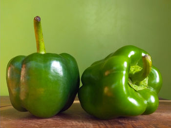 Close-up of green bell peppers on table