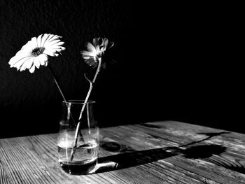 Close-up of flower vase on table