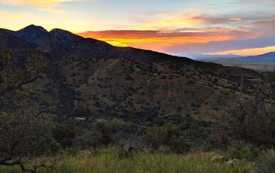 Scenic view of mountains against sky during sunset