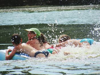 People playing in sea