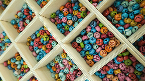 High angle view of multi colored candies in shelf