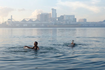 VIEW OF PEOPLE IN WATER