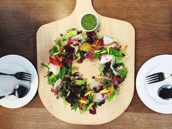 High angle view of vegetables in plate on table