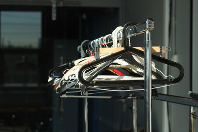 Close-up of clothes hanging on rack