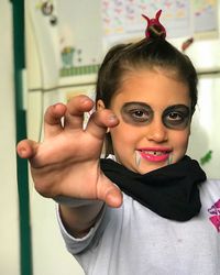 Close-up portrait of girl with halloween costume