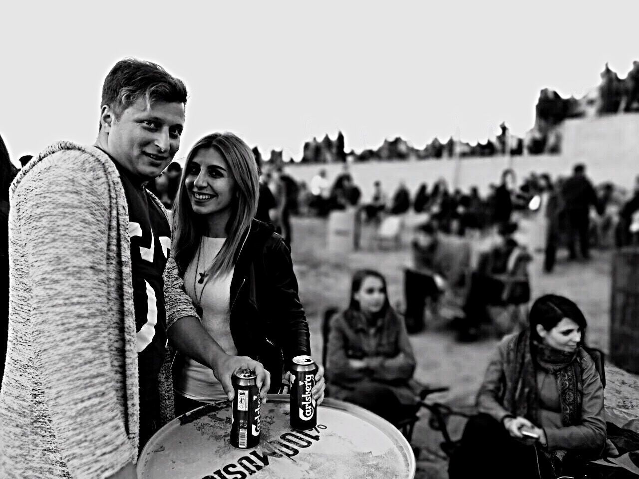 PORTRAIT OF SMILING YOUNG COUPLE