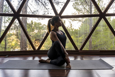 Woman looking at window