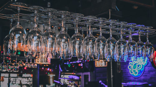 Illuminated lanterns hanging in store for sale in market