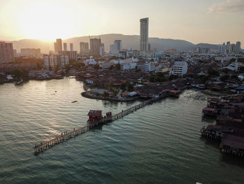 High angle view of river amidst buildings in city