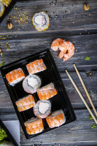 High angle view of sushi on barbecue grill