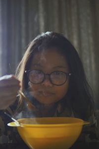 Close-up portrait of a girl in bowl