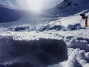 Scenic view of snow covered mountain against sky