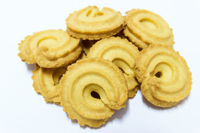 Close-up of cookies against white background