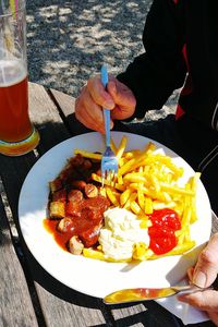 Close-up of man eating food