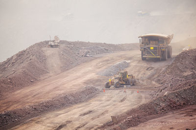 Mining activity, mining dump truck, high angle view of truck working on field