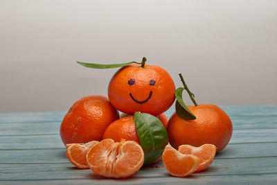 Close-up of orange fruits on table