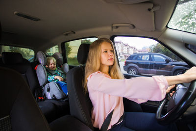 Mother and son in car