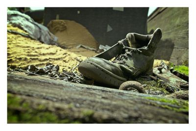Close-up of abandoned shoes