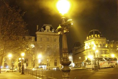 Illuminated street light at night