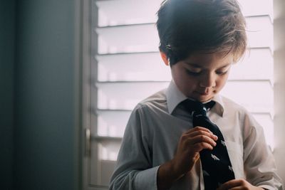 Close-up of a boy wearing tie