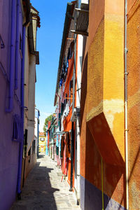 Alley in the colorful city of burano island, venice, italy