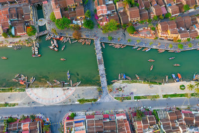 High angle view of river amidst buildings in city