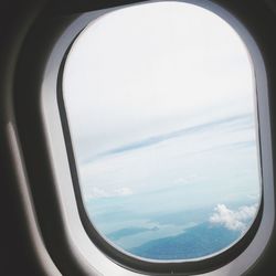 Scenic view of sky seen through airplane window