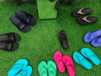 High angle view of slippers on grass