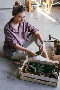 Woman working in basket