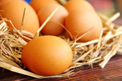 Organic chicken eggs on dry glass.