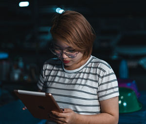 Mid adult man using smart phone