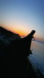 Scenic view of tree against sky during sunset