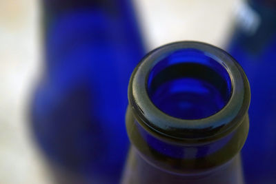 High angle view of blue bottle on table