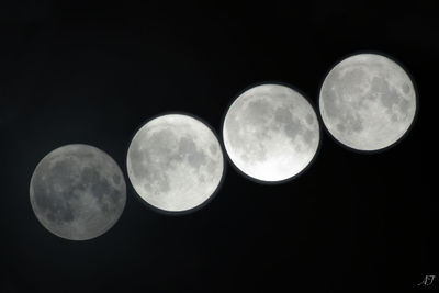 Low angle view of moon against sky at night