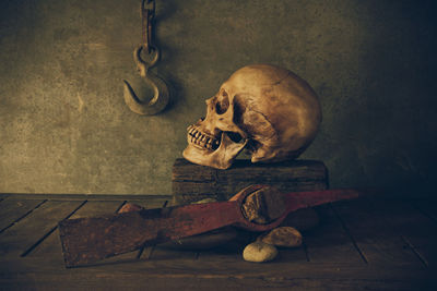 Low angle view of human skull on table