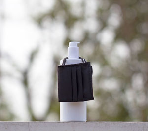 Close-up of camera against black background