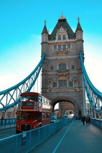 View of bridge and building against sky