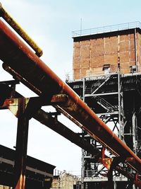 Low angle view of construction site against sky