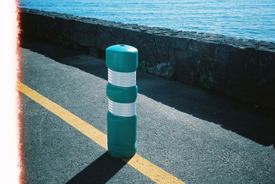 High angle view of shadow on sea shore