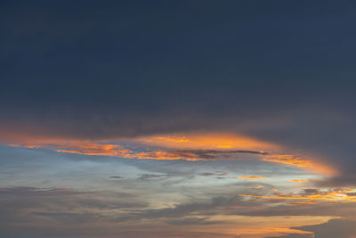 Low angle view of dramatic sky during sunset